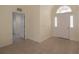 Bright and airy entryway with tile flooring and access to other rooms at 2260 Nw 51St Ter, Ocala, FL 34482