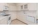 Efficient kitchen featuring white cabinets and modern appliances at 2260 Nw 51St Ter, Ocala, FL 34482