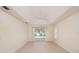 Spacious bedroom with tile floors and sliding glass doors at 2260 Nw 51St Ter, Ocala, FL 34482