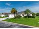 Single-story home with a two-car garage and attractive landscaping at 2260 Nw 51St Ter, Ocala, FL 34482