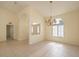 Bright dining area with tile floors, vaulted ceiling and chandelier at 2260 Nw 51St Ter, Ocala, FL 34482