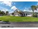 Stunning clubhouse exterior with landscaping and porte cochere at 2260 Nw 51St Ter, Ocala, FL 34482