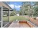 Large backyard with shed and wooden deck at 1870 Sw Valencia Heights Ave, Dunnellon, FL 34431