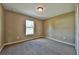 Bright bedroom with neutral wall colors and carpeting at 12789 Sw 86Th Cir, Ocala, FL 34473