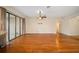 Bright living room with hardwood floors and sliding glass doors at 16292 Sw 13Th Ter, Ocala, FL 34473