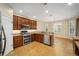 Updated kitchen with wood cabinets, granite counters and stainless steel appliances at 16292 Sw 13Th Ter, Ocala, FL 34473