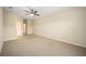 Bedroom with ceiling fan and carpet flooring at 16292 Sw 13Th Ter, Ocala, FL 34473