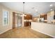 Kitchen features a breakfast bar and ample cabinetry at 16292 Sw 13Th Ter, Ocala, FL 34473