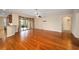 Spacious living area featuring hardwood floors and access to patio at 16292 Sw 13Th Ter, Ocala, FL 34473