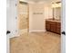 Bathroom features a walk-in shower and granite vanity at 16292 Sw 13Th Ter, Ocala, FL 34473
