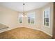 Bright dining room with tile flooring and window shutters at 16292 Sw 13Th Ter, Ocala, FL 34473