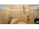 Large walk-in shower with tiled walls and seat at 16292 Sw 13Th Ter, Ocala, FL 34473