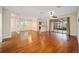 Open living area with hardwood floors and access to the kitchen at 16292 Sw 13Th Ter, Ocala, FL 34473