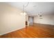 Bright dining area with hardwood floors and views to living room at 16292 Sw 13Th Ter, Ocala, FL 34473