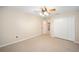Bedroom with double door closet and carpet flooring at 16292 Sw 13Th Ter, Ocala, FL 34473