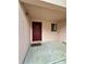 Front entrance with red door and welcome mat at 2851 Sw 32Nd Ave # 12, Ocala, FL 34474