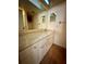 Bright bathroom boasts a vanity with granite countertop at 2851 Sw 32Nd Ave # 12, Ocala, FL 34474