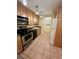 Updated kitchen with ample cabinetry and stainless steel appliances at 2851 Sw 32Nd Ave # 12, Ocala, FL 34474