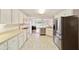 Kitchen boasts stainless steel appliances and an open layout at 9372 Sw 90Th St, Ocala, FL 34481