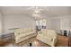 Spacious living room with hardwood floors and ample natural light at 7679 S Magnolia Ave, Ocala, FL 34476