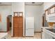 Kitchen featuring ample cabinet space and refrigerator at 7679 S Magnolia Ave, Ocala, FL 34476