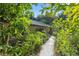 Landscaped walkway leading to the front entrance of the house at 7679 S Magnolia Ave, Ocala, FL 34476