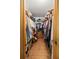 Large walk-in closet with ample shelving and hanging space at 7679 S Magnolia Ave, Ocala, FL 34476
