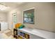 Laundry room with washer, dryer, storage, and exterior access at 7679 S Magnolia Ave, Ocala, FL 34476