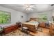 Bedroom with wooden bed frame and ample closet space at 7679 S Magnolia Ave, Ocala, FL 34476