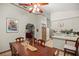 Dining room with kitchen view, offering an open floor plan at 7679 S Magnolia Ave, Ocala, FL 34476