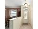 Bright entryway with decorative glass door and adjacent dining room at 9500 Sw 93Rd Loop, Ocala, FL 34481