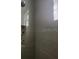 Stand-up shower with stone accent at 13260 Se 33Rd Ct, Belleview, FL 34420