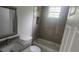 Clean bathroom with a bathtub and granite countertop at 13260 Se 33Rd Ct, Belleview, FL 34420
