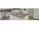 Kitchen island with a beautiful granite countertop at 13260 Se 33Rd Ct, Belleview, FL 34420