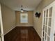 Home office with dark wood flooring and a ceiling fan at 6716 Sw 91St Cir, Ocala, FL 34481