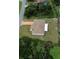 House with screened patio, large yard, and a fenced perimeter at 15747 Sw 47Th Avenue Rd, Ocala, FL 34473
