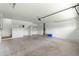 Garage with staircase to upper level, and automatic opener at 9818 Sw 99Th Loop, Ocala, FL 34481