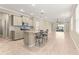 Open kitchen with island, stainless steel appliances, and granite countertops at 9818 Sw 99Th Loop, Ocala, FL 34481