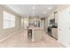 Open concept kitchen featuring an island and stainless steel appliances at 9818 Sw 99Th Loop, Ocala, FL 34481