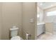 Toilet and a portion of a bathroom vanity at 9818 Sw 99Th Loop, Ocala, FL 34481