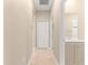 Hallway with neutral walls and carpet flooring at 9818 Sw 99Th Loop, Ocala, FL 34481