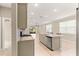 Kitchen with island, stainless steel appliances and granite countertops at 9818 Sw 99Th Loop, Ocala, FL 34481
