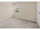 Bright bedroom with neutral carpeting and window at 4230 Sw 50Th Cir, Ocala, FL 34474