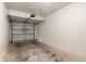 Empty garage with white door and concrete floor at 4230 Sw 50Th Cir, Ocala, FL 34474