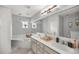 Bathroom boasts double sinks, a soaking tub, and updated fixtures at 13783 Se 8Th Ct, Ocala, FL 34480