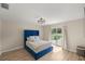 Bedroom with sliding glass doors leading to patio at 13783 Se 8Th Ct, Ocala, FL 34480