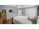 Bedroom with sliding door access to backyard at 13783 Se 8Th Ct, Ocala, FL 34480