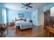 Large bedroom with wood flooring and ceiling fan at 8655 Sw 86Th Cir, Ocala, FL 34481