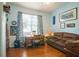 Bright bedroom with a desk, couch, and ample natural light at 8655 Sw 86Th Cir, Ocala, FL 34481