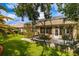 Private backyard with screened patio and lawn space at 8655 Sw 86Th Cir, Ocala, FL 34481